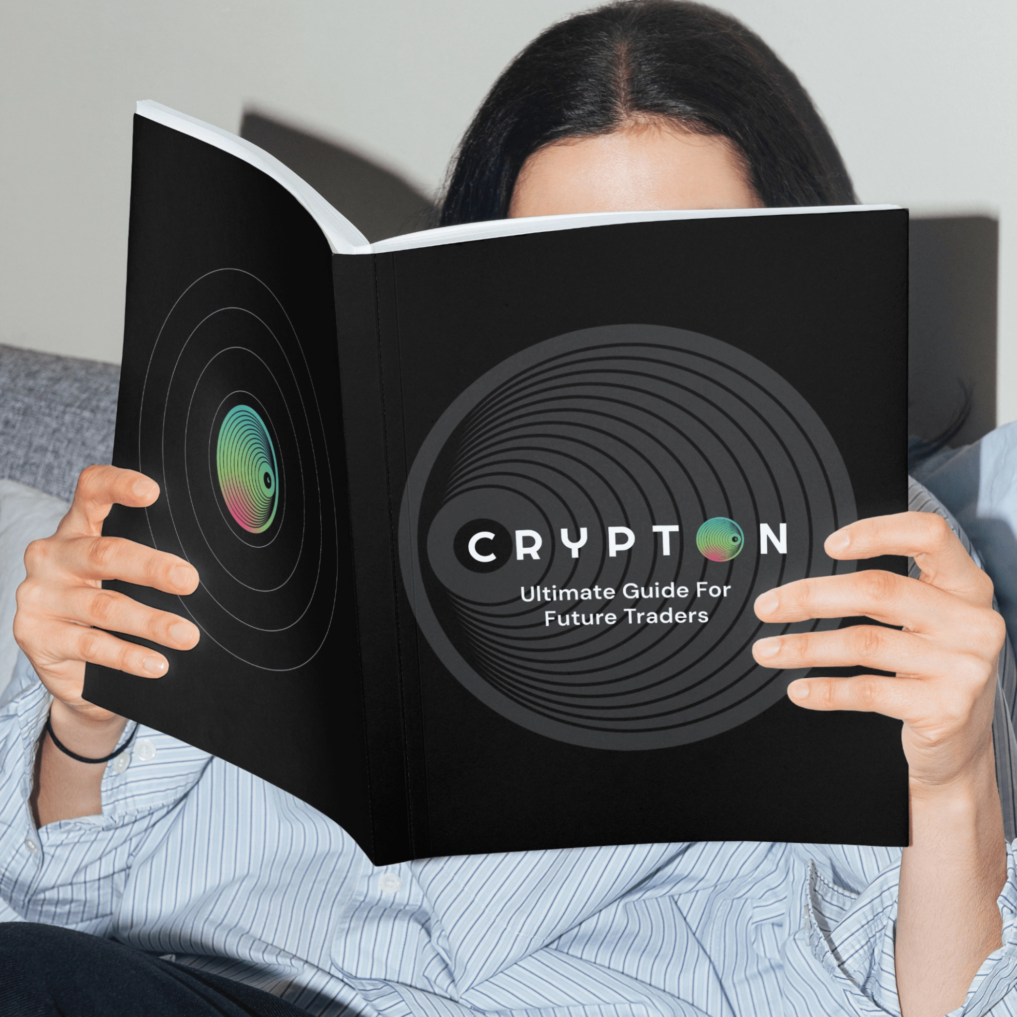 Person reading Crypton guidebook